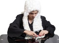 Female corrupt judge counting money at table