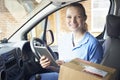 Portrait Of Female Courier In Van With Digital Tablet Delivering Royalty Free Stock Photo