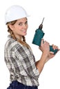 Female craftswoman holding drill Royalty Free Stock Photo