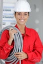 Female craftswoman holding pipes Royalty Free Stock Photo