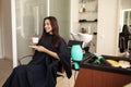 Female customer with coffee, hairsalon Royalty Free Stock Photo
