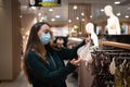 Woman choosing underwear in mall