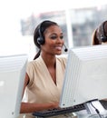 Female customer service agent in a call center