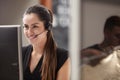 Female Customer Services Agent Working At Desk In Call Center Royalty Free Stock Photo