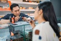 female customer vaping inside the vape store