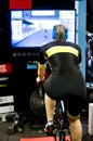 Female cyclist training indoor