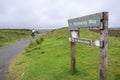 Female cyclist riding along the Waskerley Way in County Durham, UK