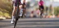 Female cyclist riding racing bicycle