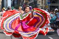 Female dancer wearing a bright traditional dress during the Mexican Independence Day Parade