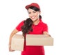 Female delivery service happily delivering package to costumer Royalty Free Stock Photo