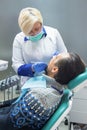 Female dental doctor working.