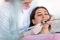 Dentist and patient in dentist office Royalty Free Stock Photo