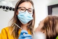 Female Dentist With Tools