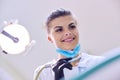 Female dentist treating teeth to patient, close-up face Royalty Free Stock Photo