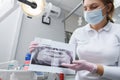 Female dentist working at her clinic Royalty Free Stock Photo