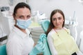 Professional dental hygienist working