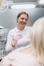 Female dentist working at her clinic Royalty Free Stock Photo