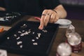 Female designer making jewelries at a jewelry shop