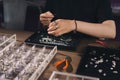 Female designer making jewelries at a jewelry shop Royalty Free Stock Photo