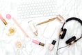 Female desktop with accessories on a marble background. Flat lay