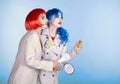 Female detectives investigate a crime. Young women in comic pop art make-up style