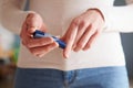 Female Diabetic Checking Blood Sugar Levels Royalty Free Stock Photo