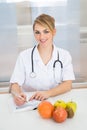 Female dietician in clinic Royalty Free Stock Photo