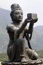 Female disciple statue at Big Buddha, Hong Kong Royalty Free Stock Photo