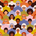 Female diverse faces of different ethnicity seamless pattern. Women empowerment movement pattern. International women s