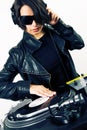 Female DJ scratching the record Royalty Free Stock Photo