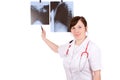 Female doc pointing at x-ray, isolated Royalty Free Stock Photo