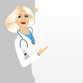 Female doctor with a blank presentation board Royalty Free Stock Photo