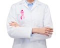 Female doctor with breast cancer awareness ribbon Royalty Free Stock Photo