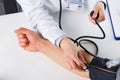 Female Doctor Checking Blood Pressure Of Patient Royalty Free Stock Photo