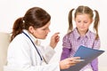 Female doctor with child at medical office