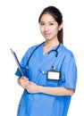 Female doctor with clipboard Royalty Free Stock Photo