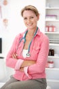 Female doctor in consulting room Royalty Free Stock Photo