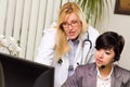 Female Doctor Discusses Work with Receptionist