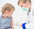 Female doctor doing vaccine. Royalty Free Stock Photo