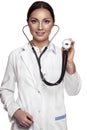 Female doctor examing with stethoscope