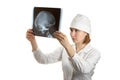 Female doctor examing an x-ray Royalty Free Stock Photo