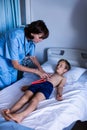 Female doctor examining abdomen of patient Royalty Free Stock Photo