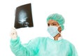 Female doctor examining a head x-ray photo scan Royalty Free Stock Photo