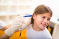 Female doctor examining little girl. Royalty Free Stock Photo