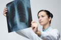 Female doctor examining x-ray image Royalty Free Stock Photo