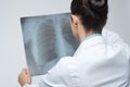 Female doctor examining x-ray image Royalty Free Stock Photo