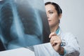 Female doctor examining x-ray image Royalty Free Stock Photo