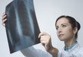 Female doctor examining x-ray image Royalty Free Stock Photo