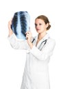 Female Doctor examining an X-ray Royalty Free Stock Photo