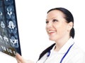 Female doctor examining x-ray picture Royalty Free Stock Photo